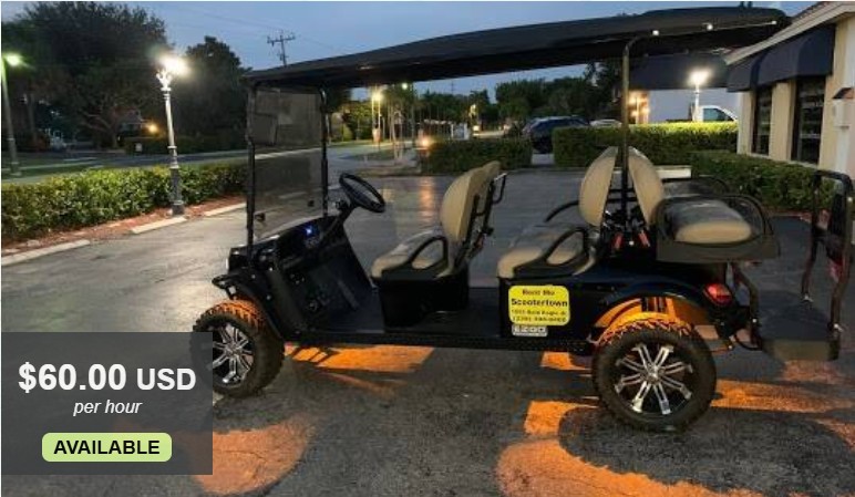 Image of a black 6-person gas powered golf cart